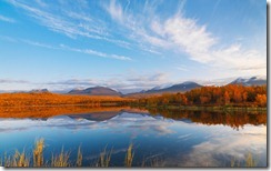 Clouds and Autumn Colors Reflected in Lake, Abisko National Park, Sweden
