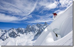 Skier descending mountain, near Chamonix-Mont-Blanc, France