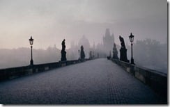 Charles Bridge crossing the Vltava river in Prague, Czech Republic