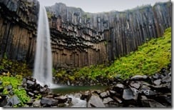 Svartifoss waterfall flanked by hexagonal basalt columns in Vatnajökull National Park, Iceland